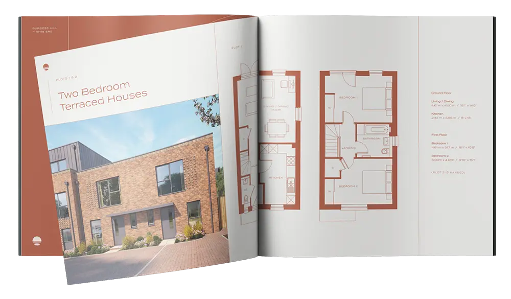 a book with a house and blueprints