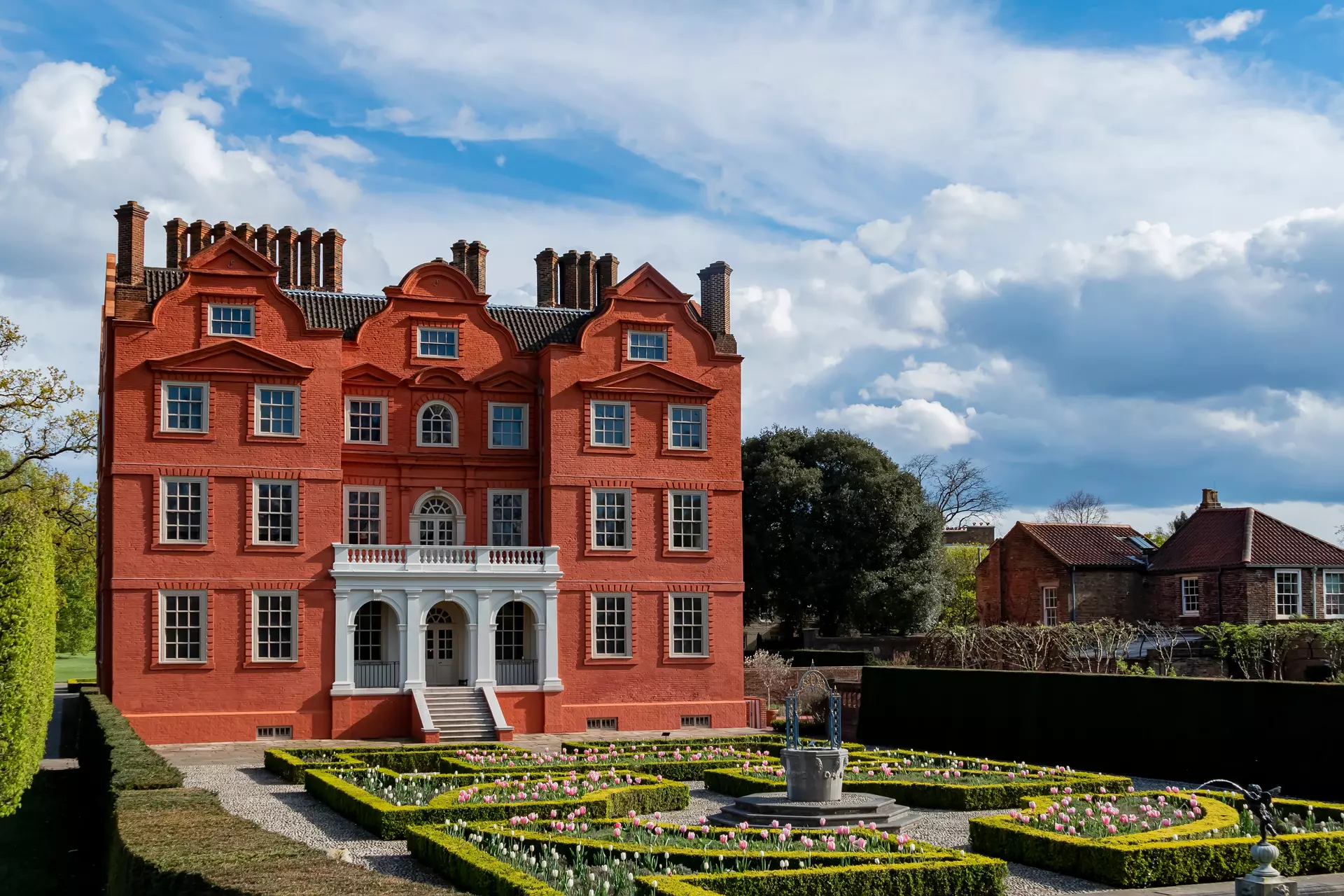 Surrey: Red brick home with maze in garden