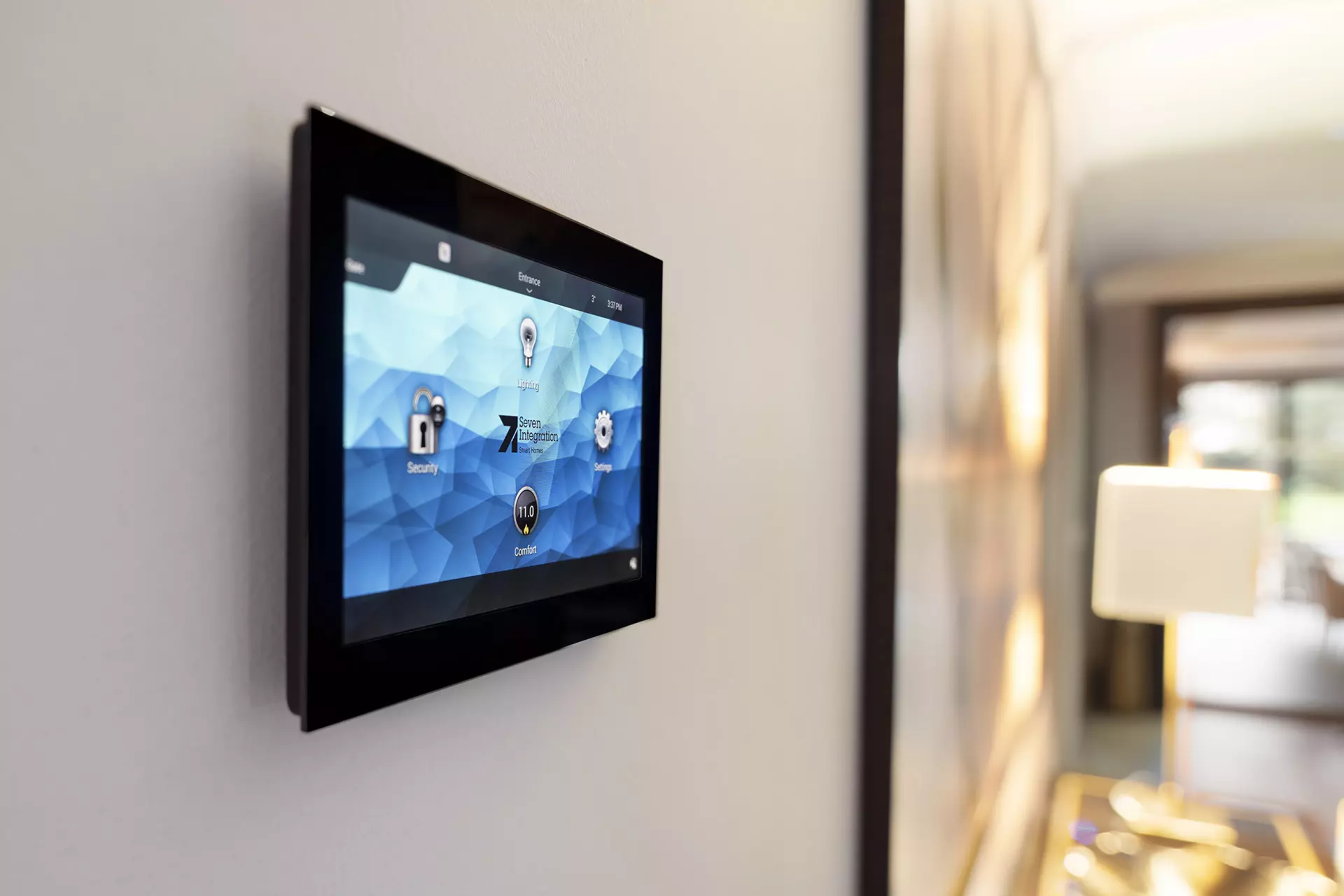 a black rectangular device on a white wall