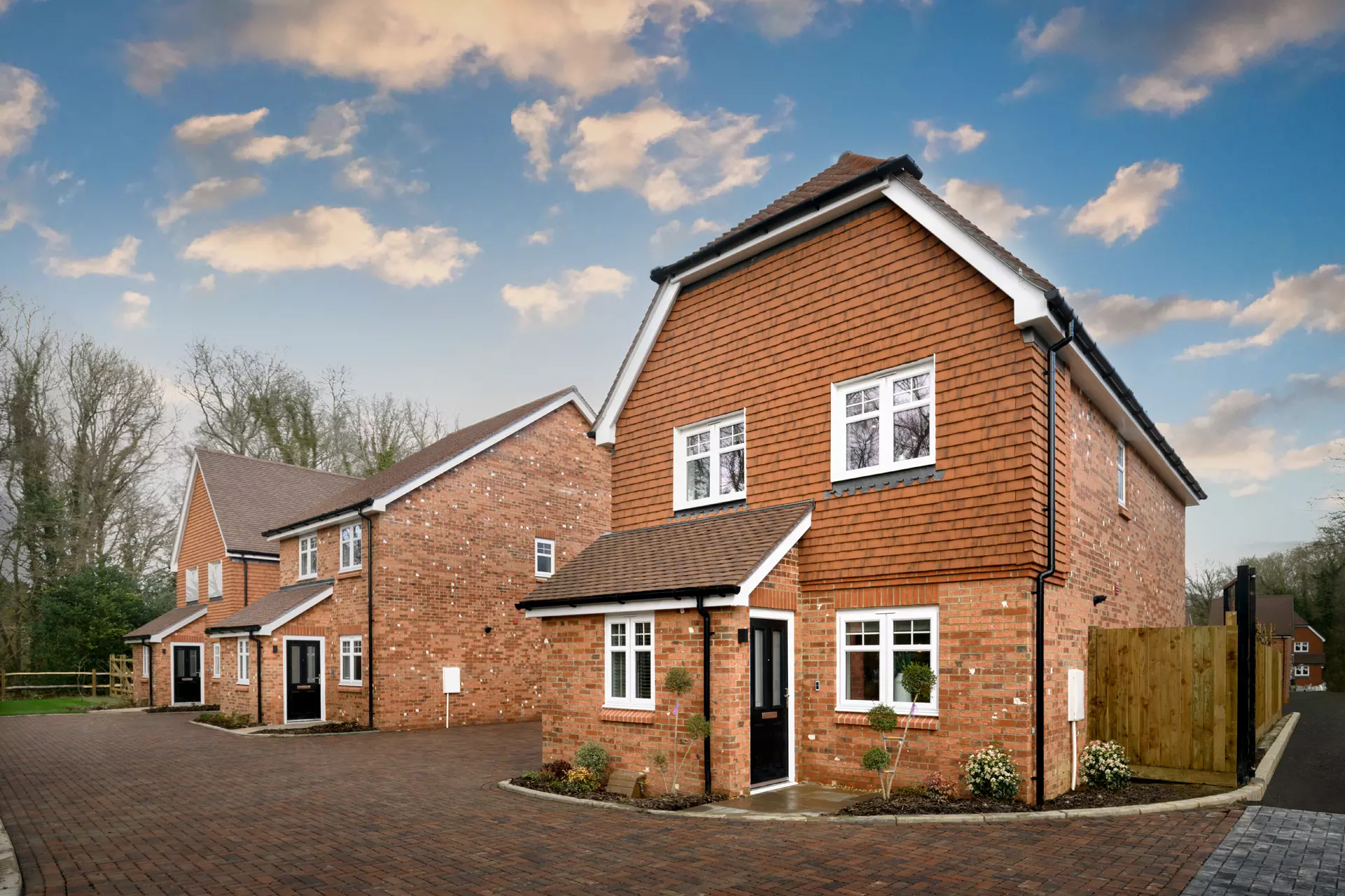 a brick house with a driveway
