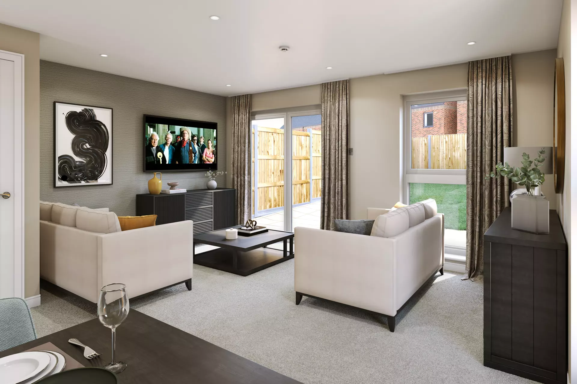 a living room with a television and a television on the wall