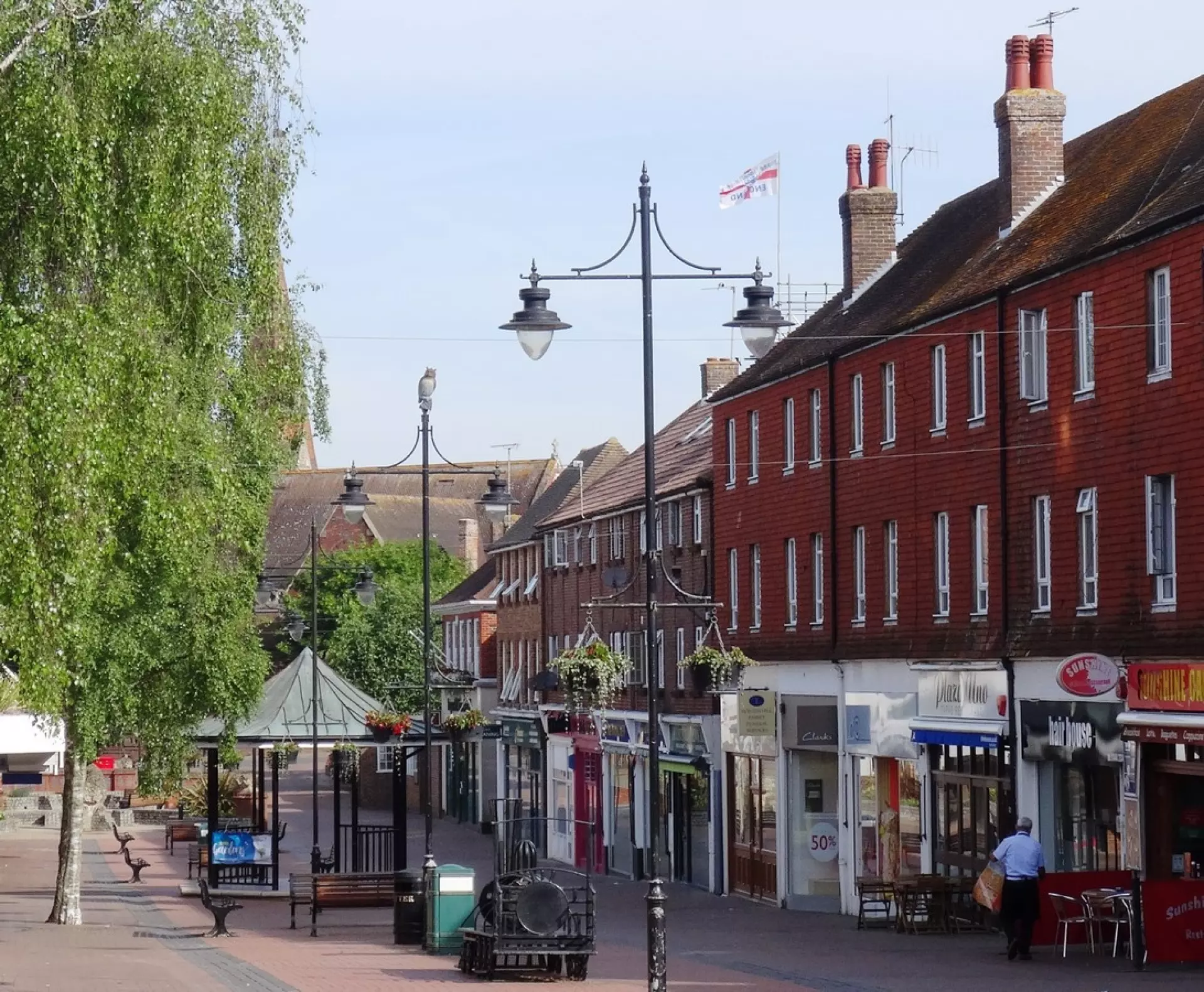 a street with buildings and trees