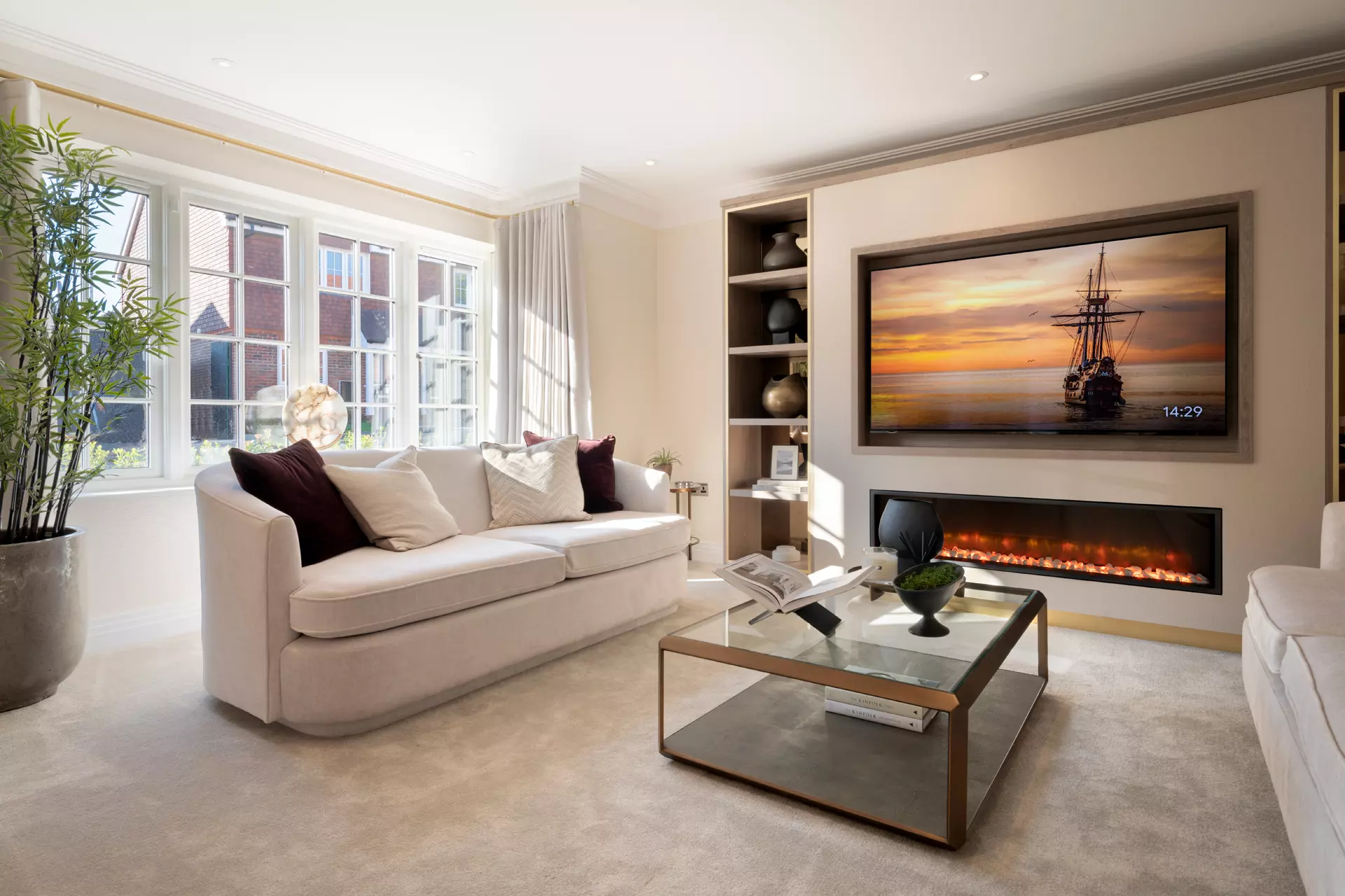 a living room with a fireplace and a couch