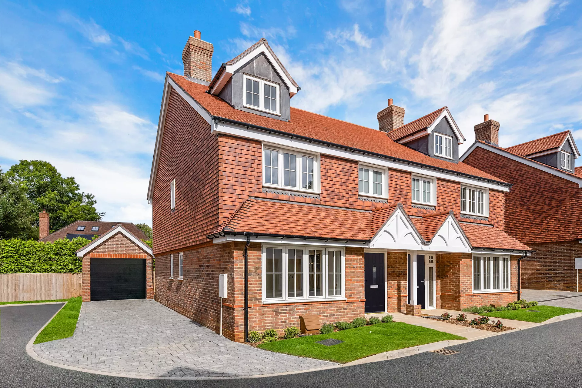 a brick house with a driveway