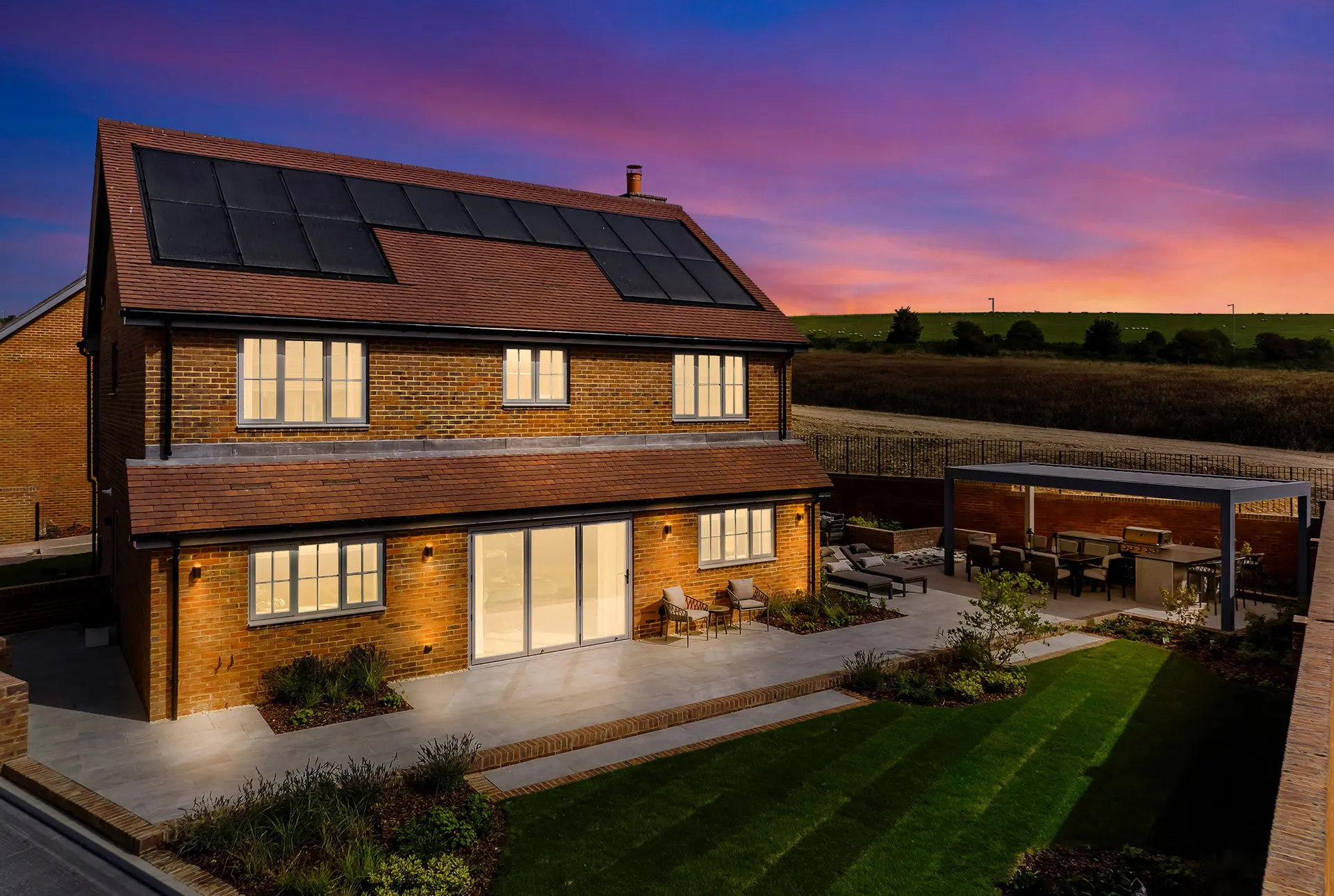 a house with a lawn and a patio
