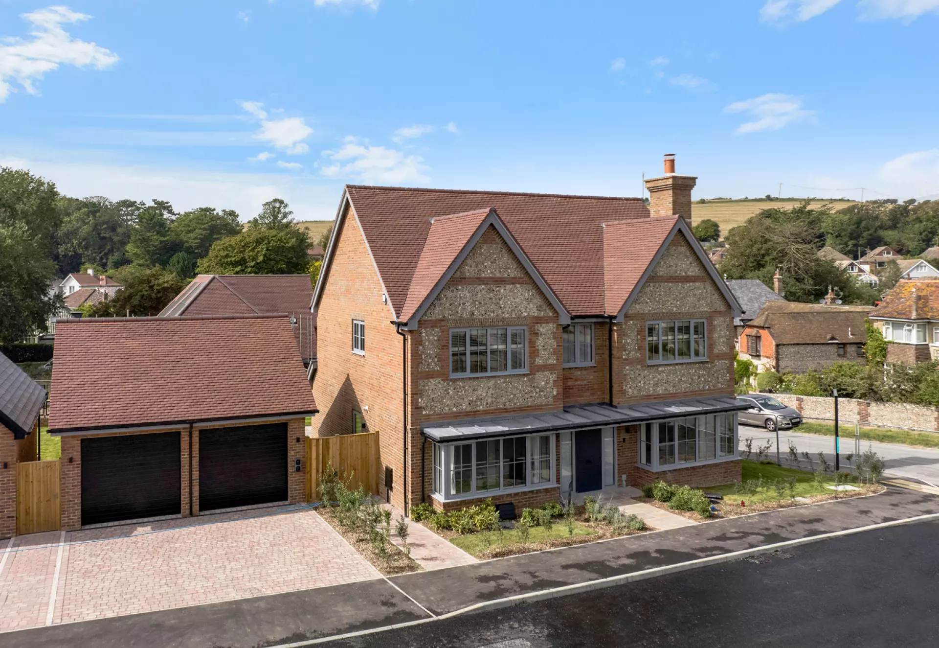 a house with a driveway and a parking lot