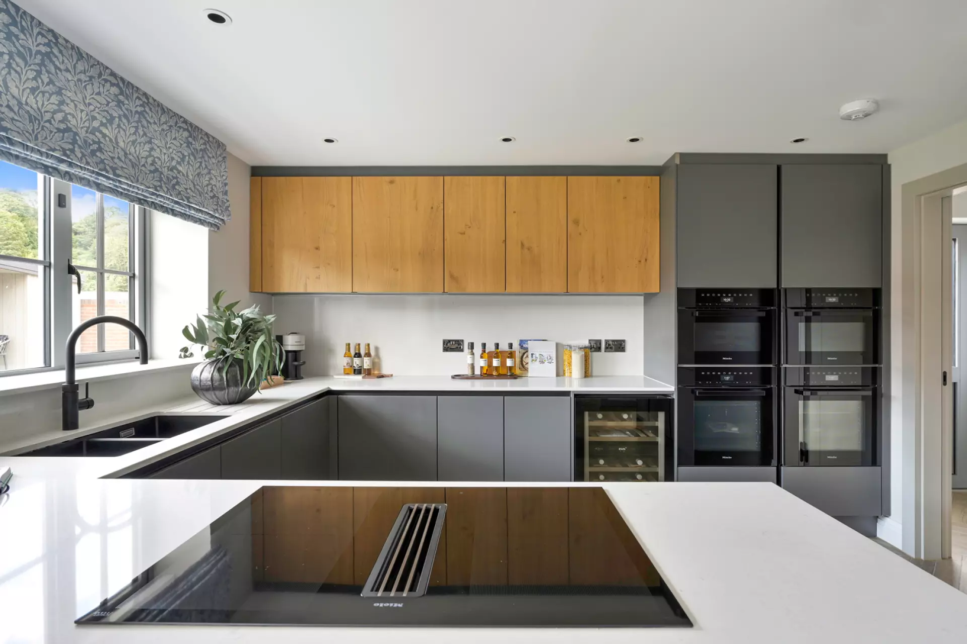 a kitchen with a large island