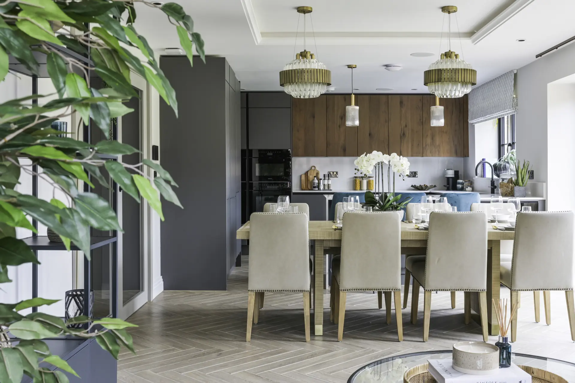 a dining room with a table and chairs