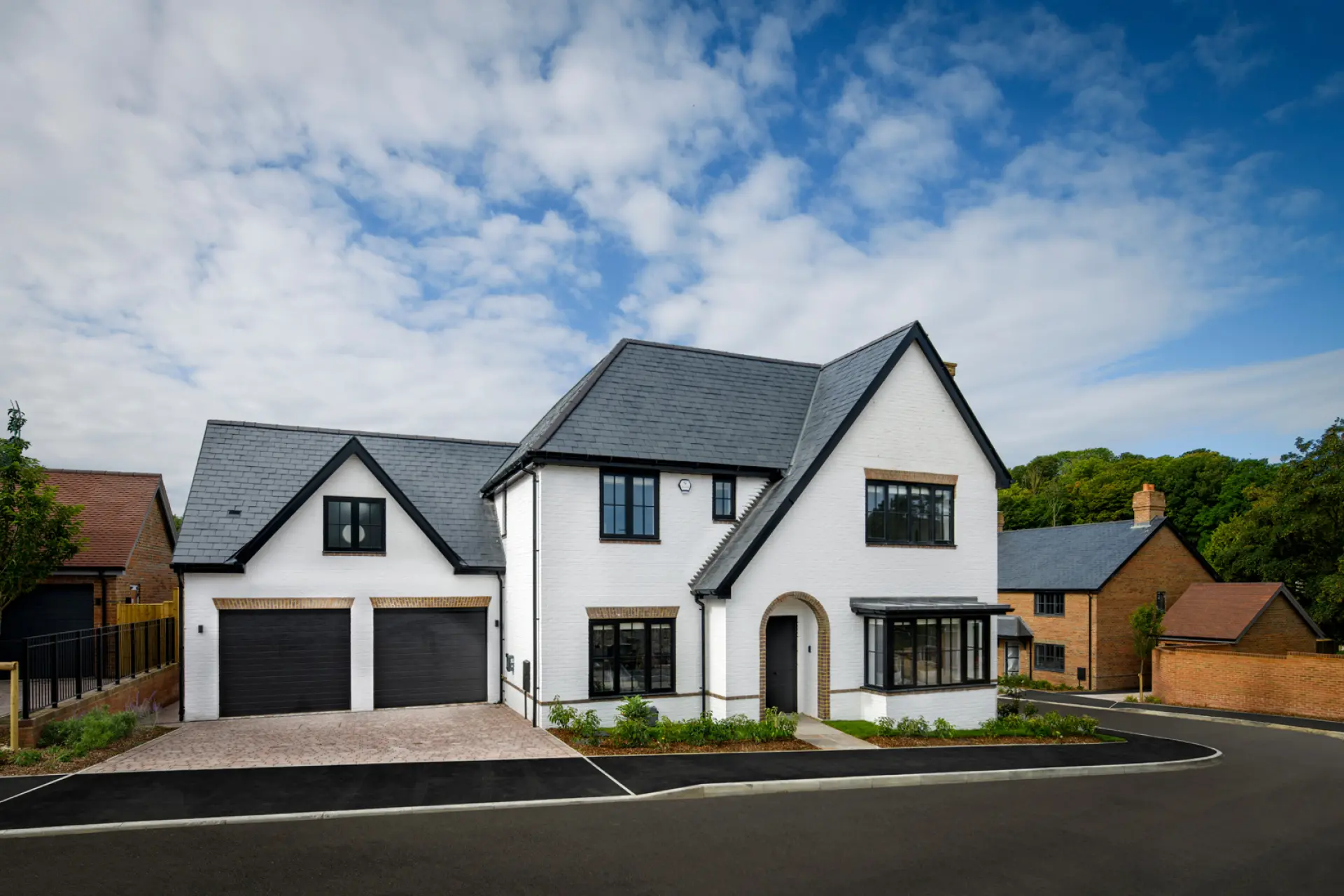 a house with a garage and a street