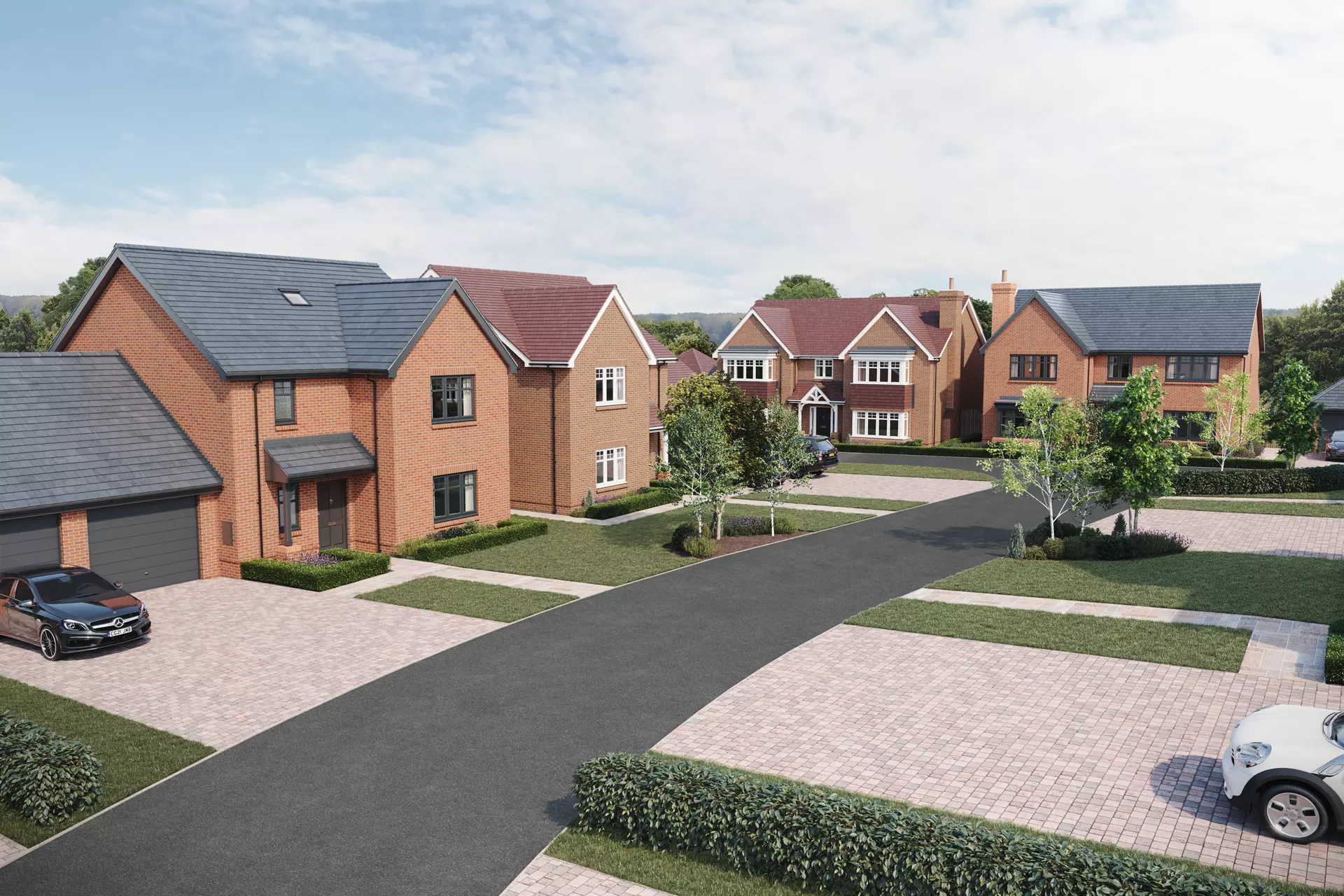 a group of houses with a driveway