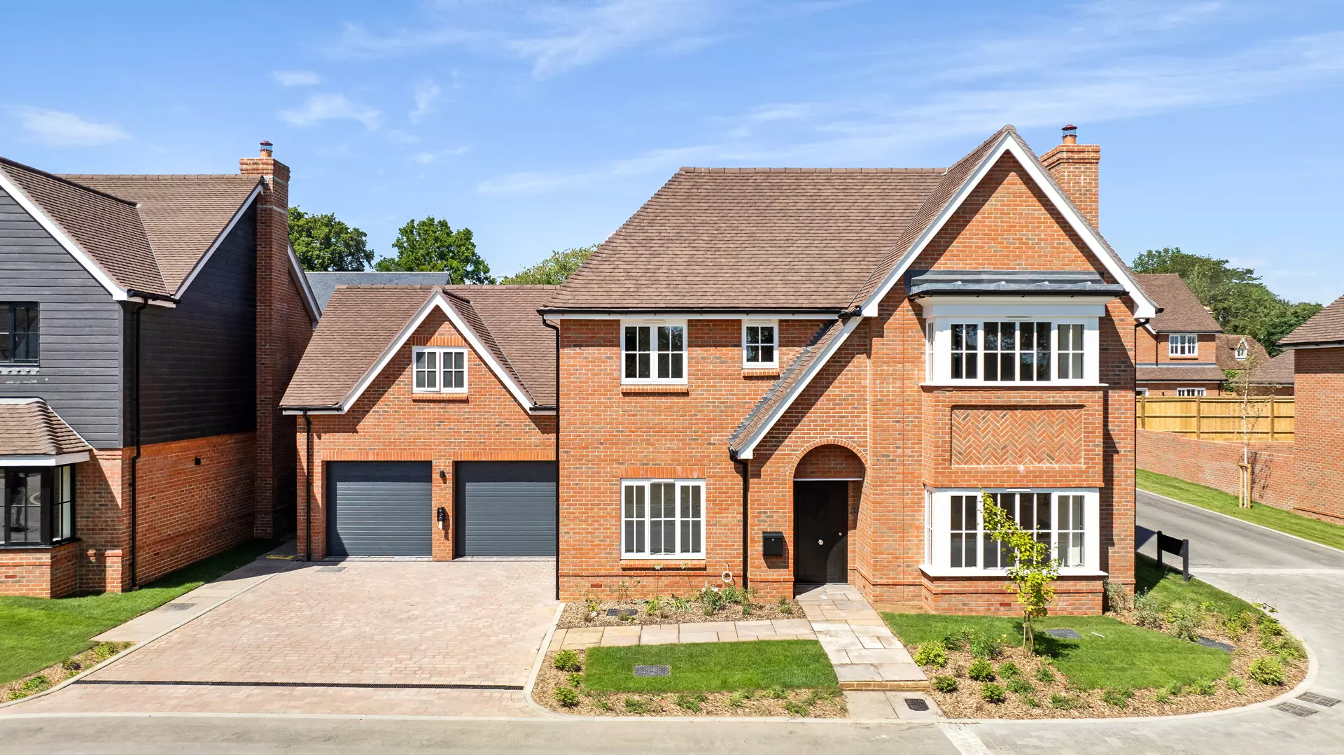 a brick house with a driveway