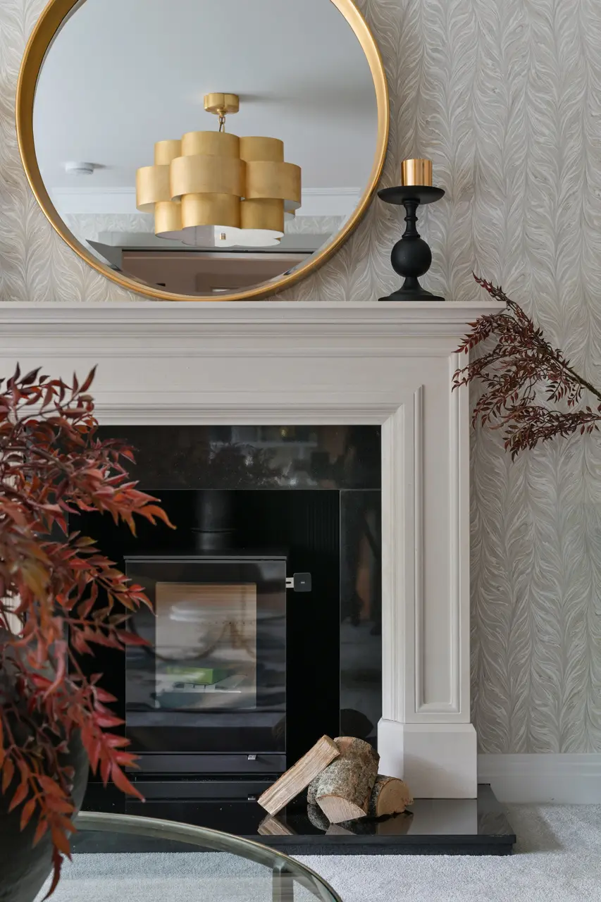 a mirror above a fireplace
